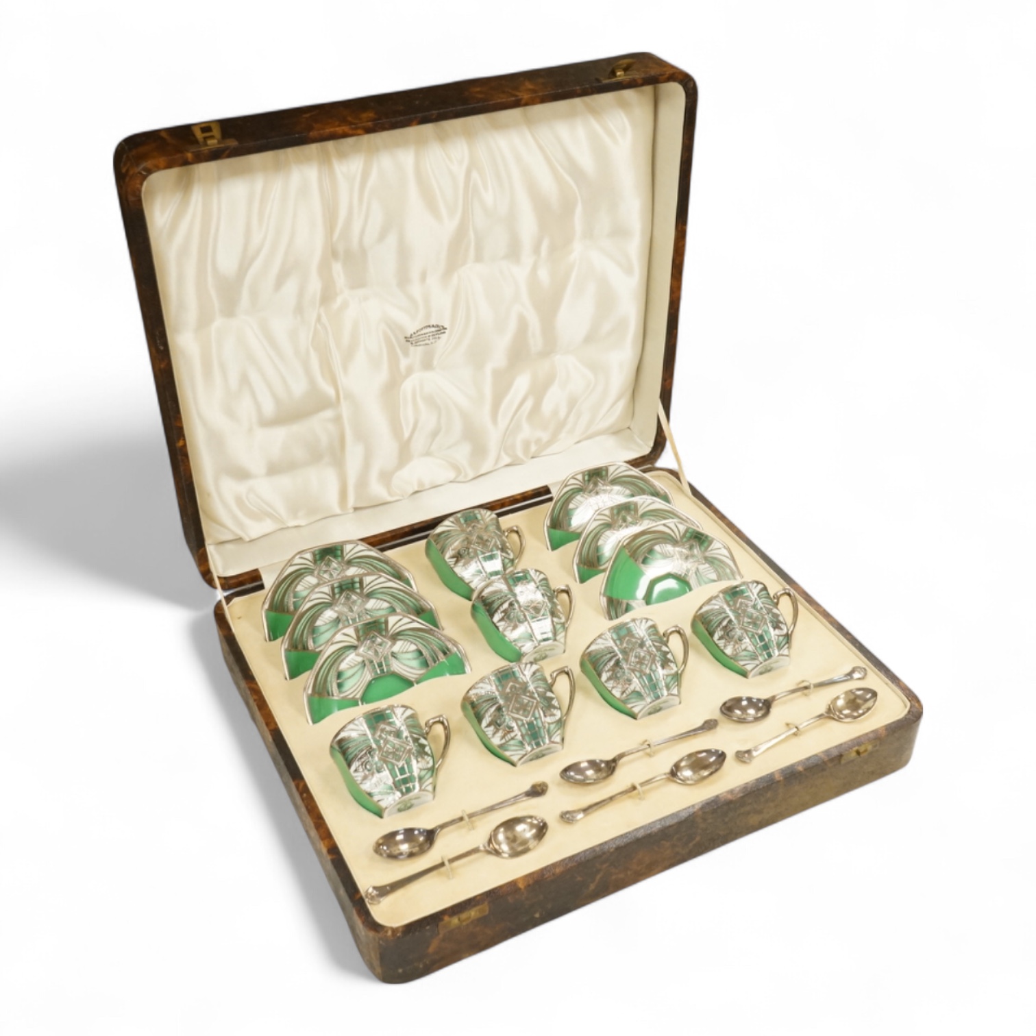 A Noritake coffee set, six-place setting including silver spoons, Sheffield 1932